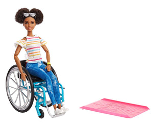 FANS ARE CELEBRATING THE AFRICAN AMERICAN BARBIE WHO USES A WHEELCHAIR